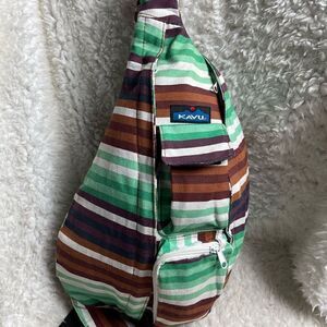 Kavu Rope sling back/ crossbody bag Canvas stripes Aztec color padded back .
